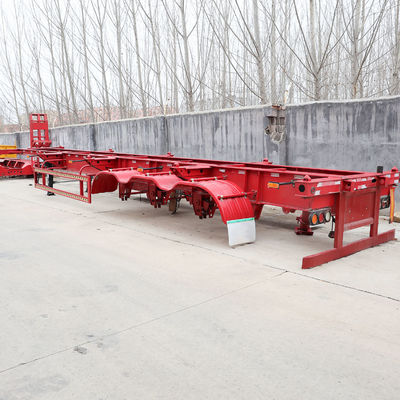 Semi remolque de cama baja plana de 40 pies para el transporte de máquinas Base de ruedas 8000-9000mm